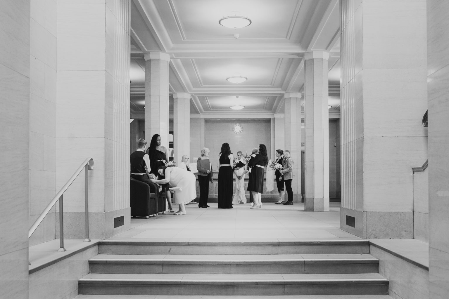 bride in the lobby of Hertford council chambers on her wedding day, London wedding photography, Romantic London wedding, beautiful London wedding venue, Bride and groom London, London wedding photography inspiration, Elegant London wedding photos, Stylish London wedding portraits, London wedding photography packages, Chic London wedding photography, London wedding photography services London wedding photographer capturing love in the city, Elegant and romantic wedding photography in London, Beautiful bridal portraits in iconic London locations, London wedding photographer creating timeless memories, Stylish and sophisticated wedding photography in London, Breathtaking images of love and celebration in London, Award-winning wedding photography in the heart of London, London's top wedding photographer capturing your special day, Chic and modern wedding photography in London, Unforgettable moments captured by a London wedding photographer