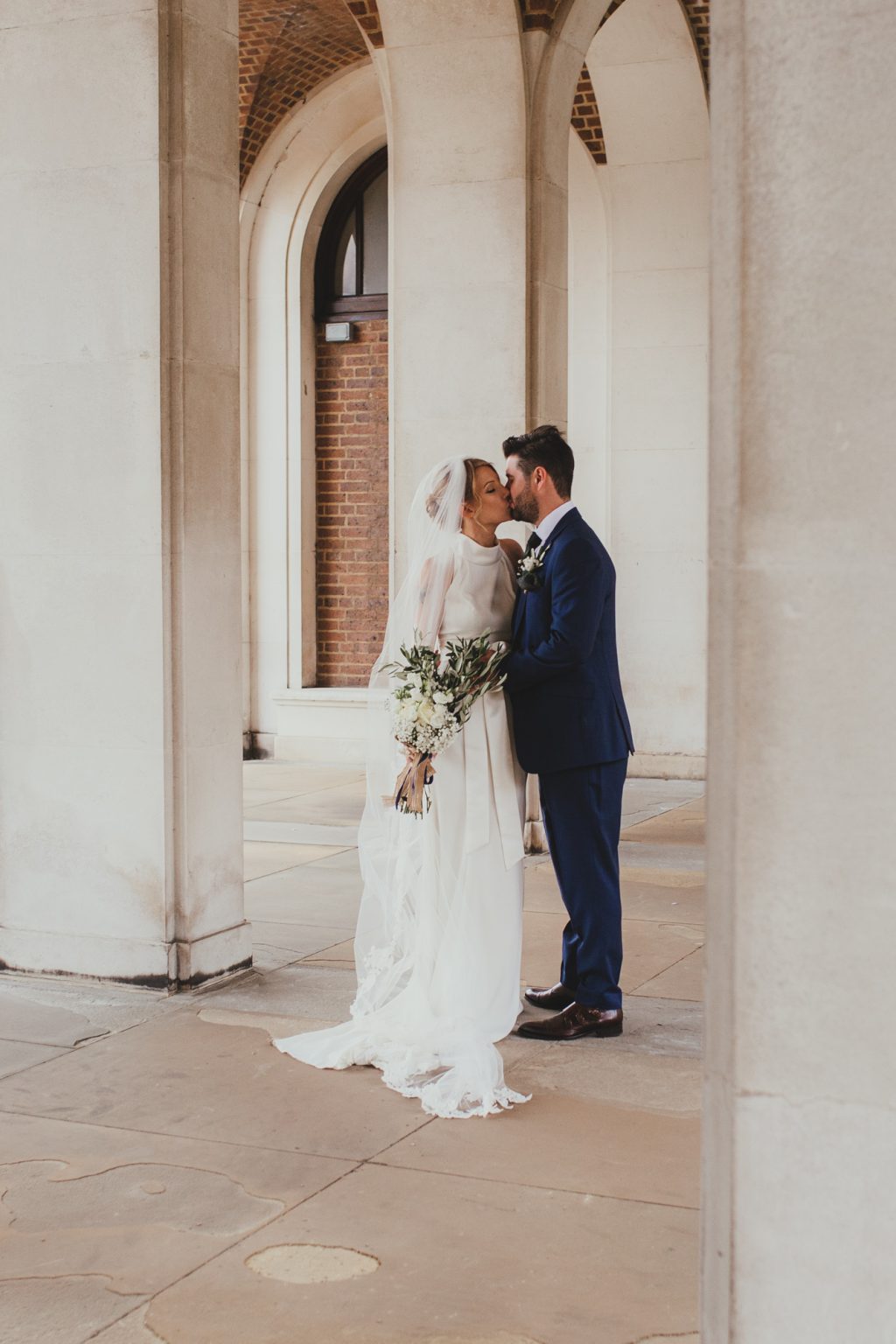 Bride and groom kissing in the archways of Hertford Council Chambers, London wedding photography, Romantic London wedding, beautiful London wedding venue, Bride and groom London, London wedding photography inspiration, Elegant London wedding photos, Stylish London wedding portraits, London wedding photography packages, Chic London wedding photography, London wedding photography services



London wedding photographer capturing love in the city,
Elegant and romantic wedding photography in London,
Beautiful bridal portraits in iconic London locations,
London wedding photographer creating timeless memories,
Stylish and sophisticated wedding photography in London,
Breathtaking images of love and celebration in London, Award-winning wedding photography in the heart of London,
London's top wedding photographer capturing your special day,
Chic and modern wedding photography in London,
Unforgettable moments captured by a London wedding photographer