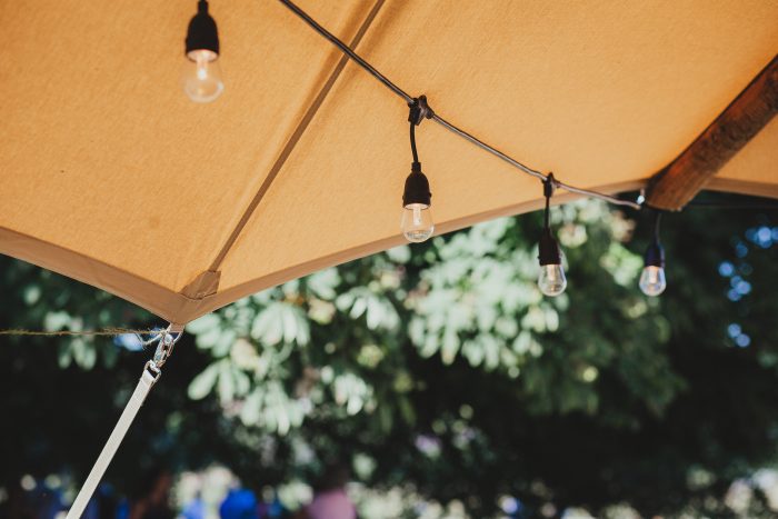 boho fairy lights at festival, tipi wedding