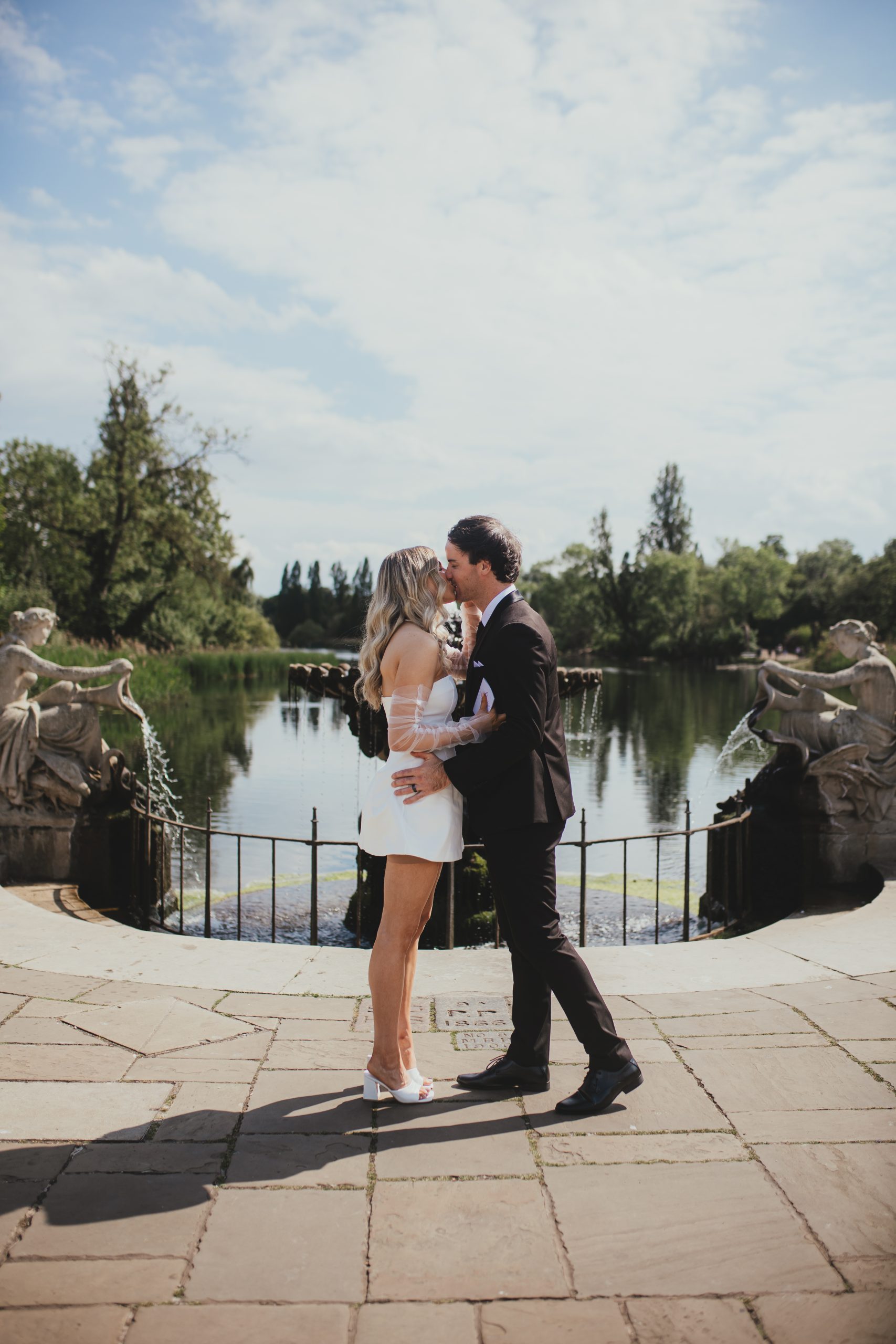 Bride and groom sharing a kiss at their London elopement, Italian Gardens