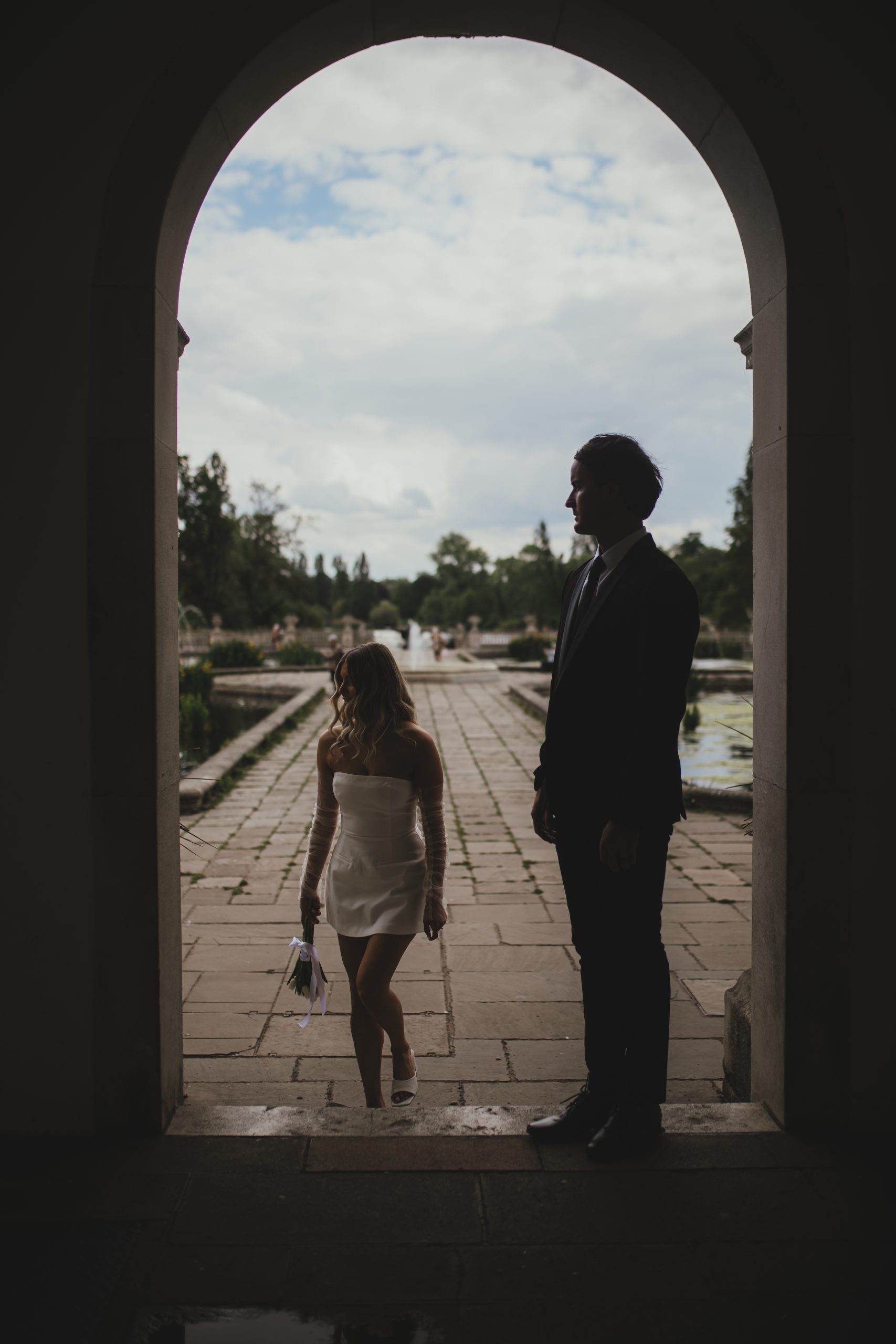 Bride and groom in an archway silhouette, Italian Gardens, London elopement
