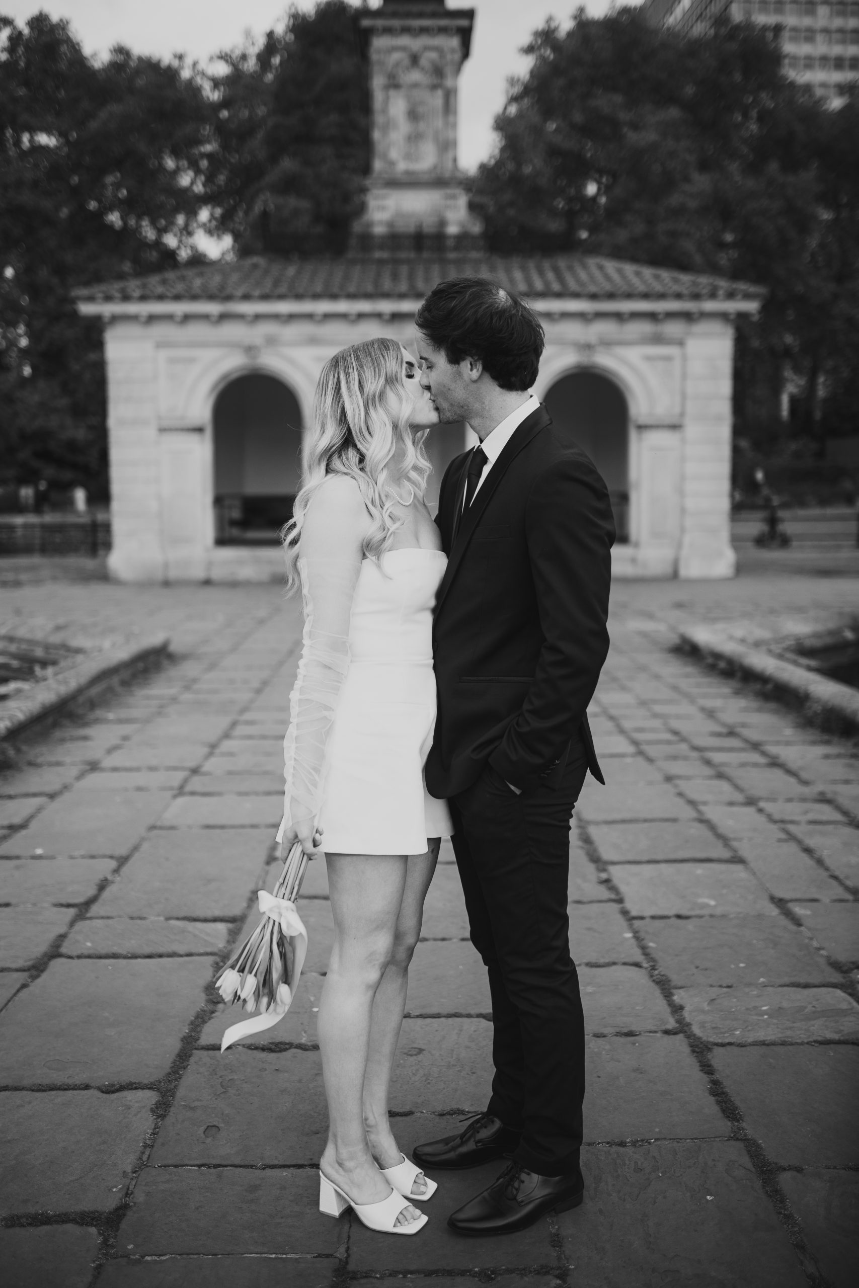 Black and white couple portrait in the Italian Gardens on their wedding day