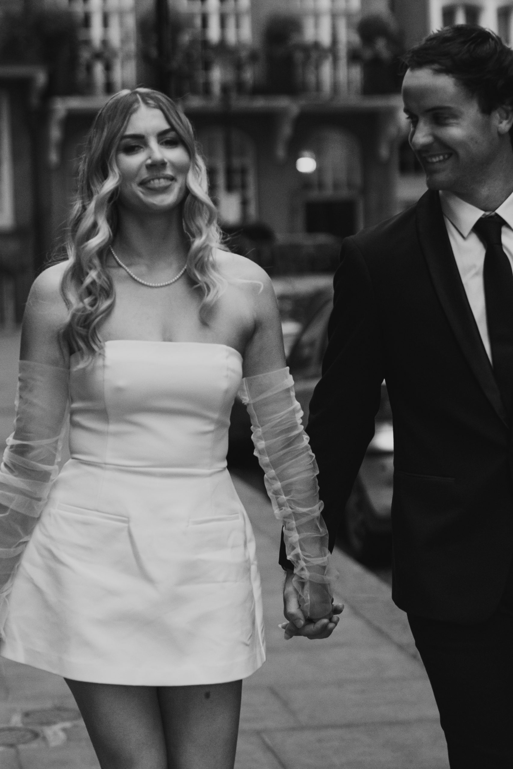 Bride walking in London, candid editorial wedding photograph