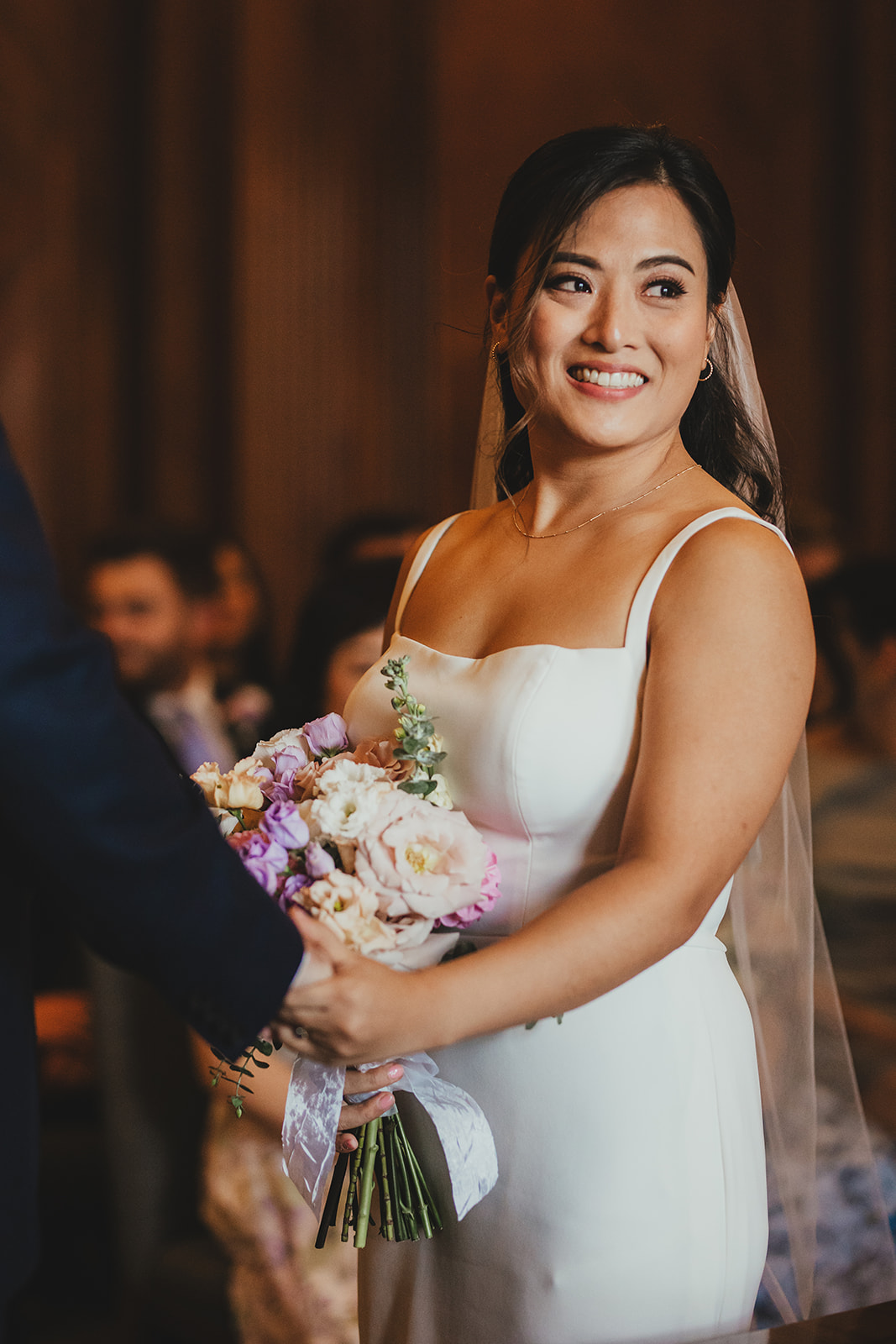 Bride smiling during vows in the Westminster Room