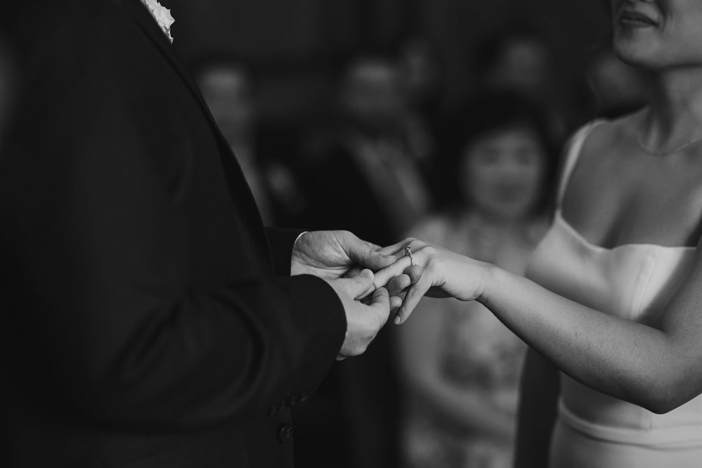 Close-up of wedding rings during the ceremony at Old Marylebone Town Hall