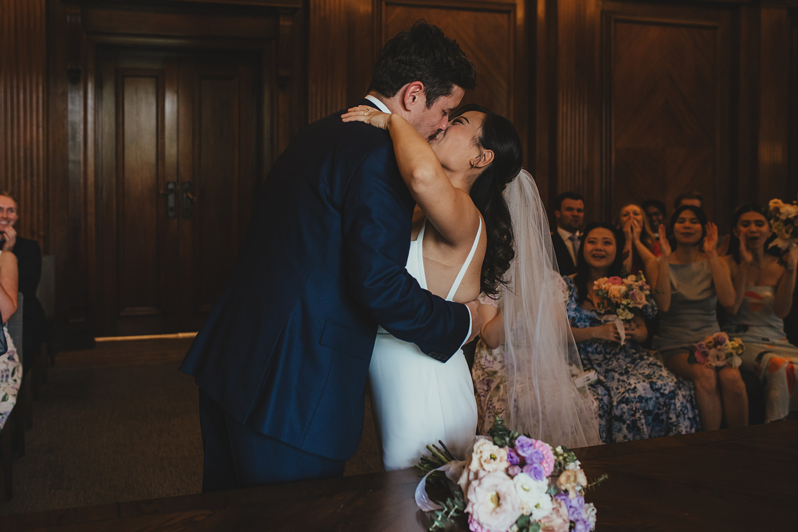 Bride and Groom kiss at the ceremony in Westminster