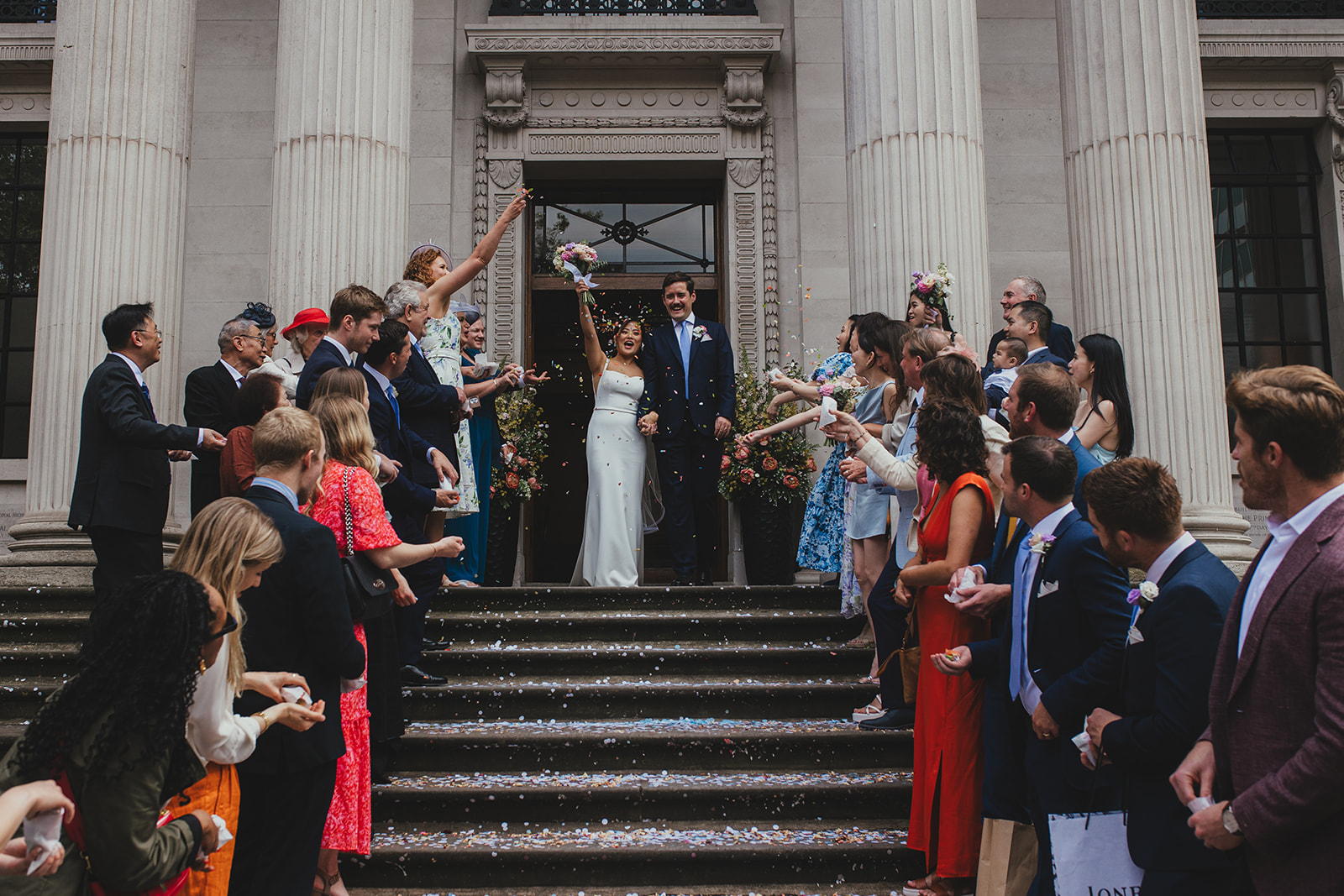 Confetti moment on the steps at Old Marylebone Town Hall