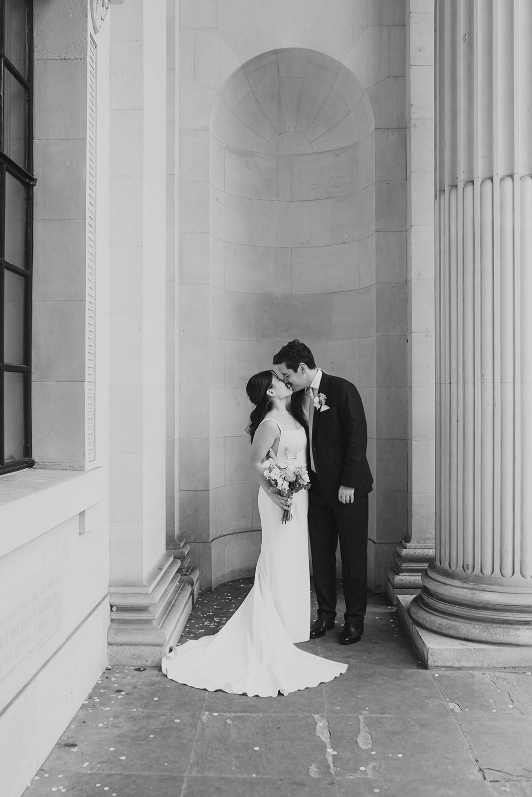 Bride and Groom Portrait in the arches at Old Marylebone Town Hall, London