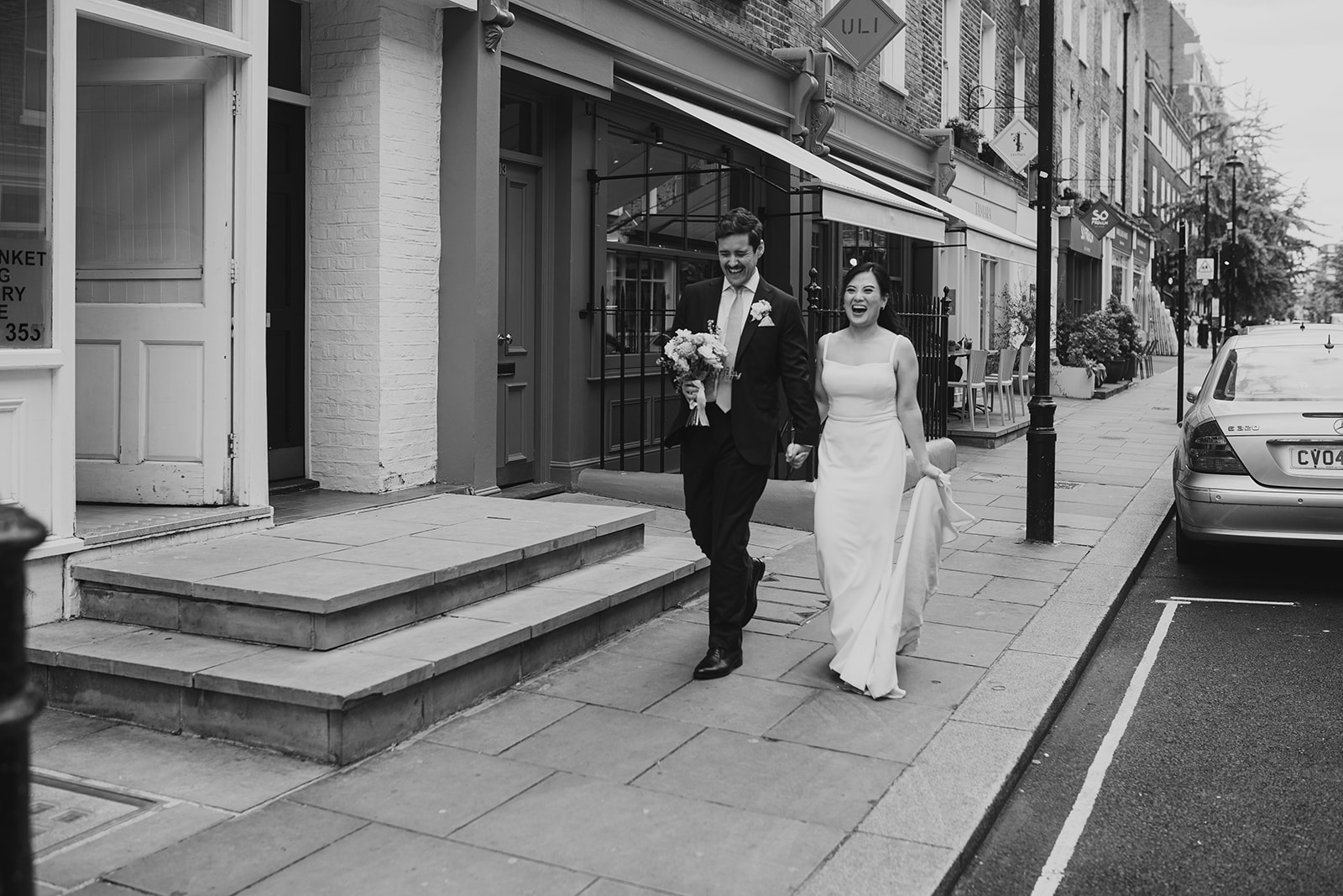 Bride and Groom walking to The Italian Greyhound, Marylebone
