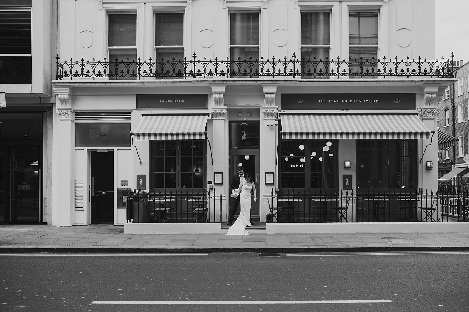 Bride and Groom arriving at wedding reception at The Italian Greyhound, Marylebone