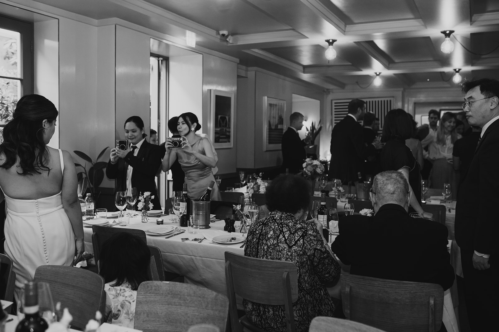 Guests at wedding reception at The Italian Greyhound, Marylebone