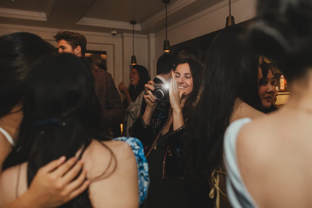 Wedding reception drinks and atmosphere, taking photos at The Italian Greyhound, London