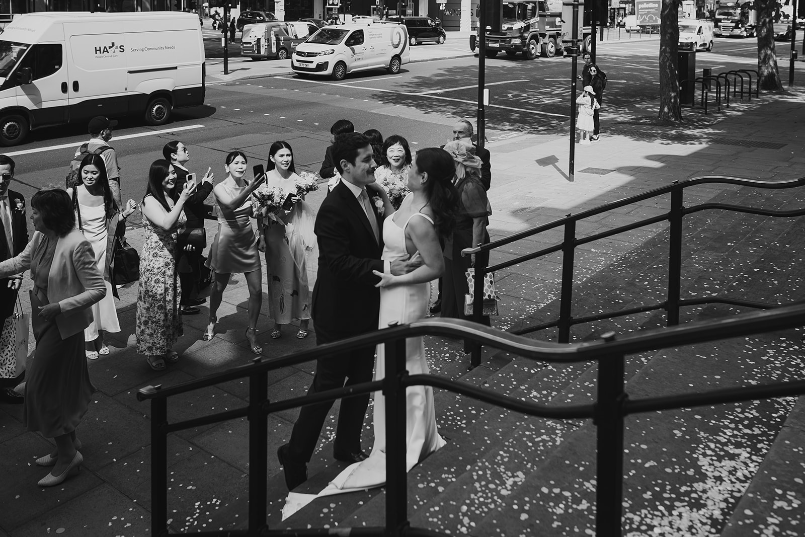 Bride and groom portrait on the steps of Old Marylebone Town Hall