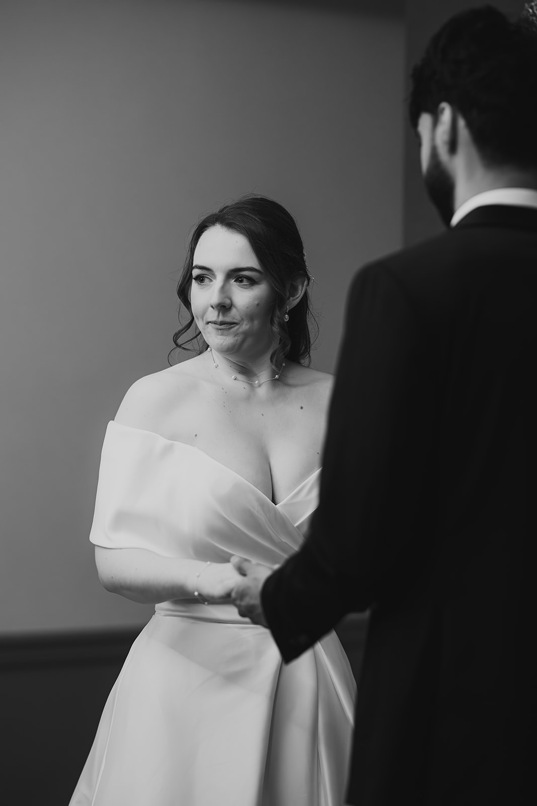 Black and white portrait of the bride and groom during their ceremony at Old Marylebone Town Hall