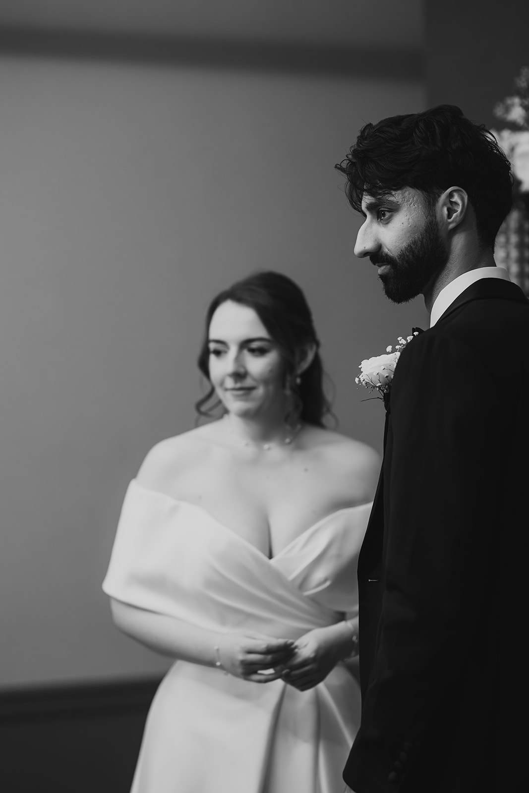 Black and white portrait of the bride and groom during their ceremony at Old Marylebone Town Hall