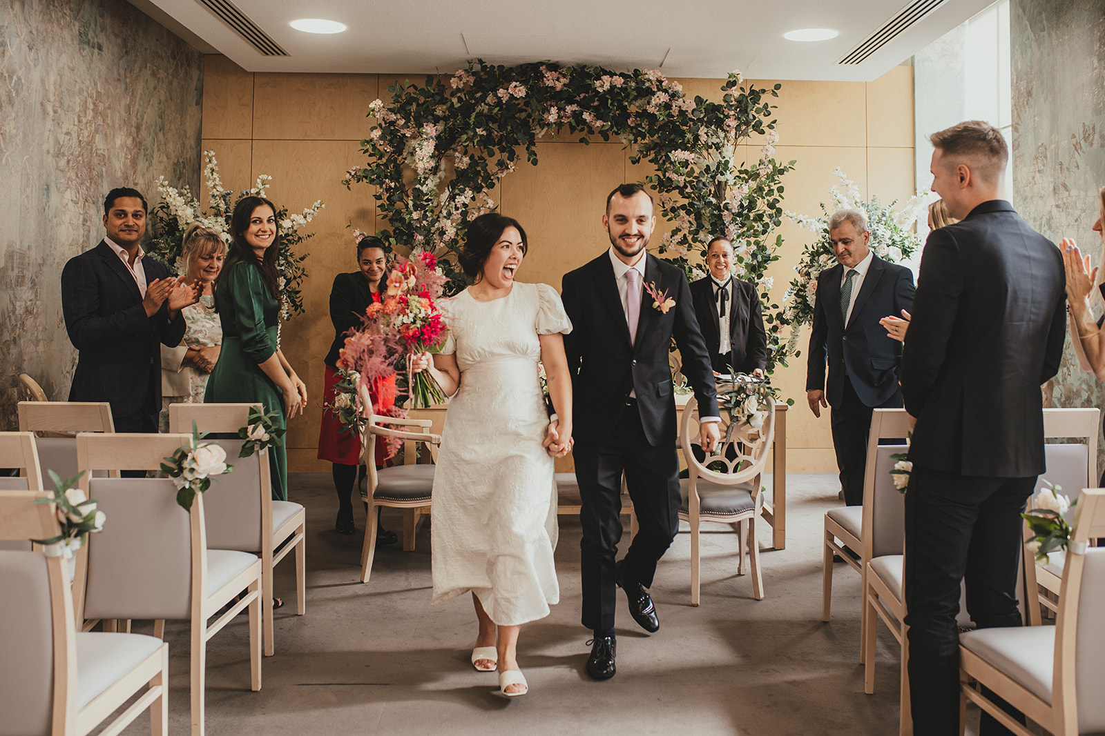 Lambeth Town Hall wedding ceremony in the Olive Morris Suite, leaving the room as husband and wife