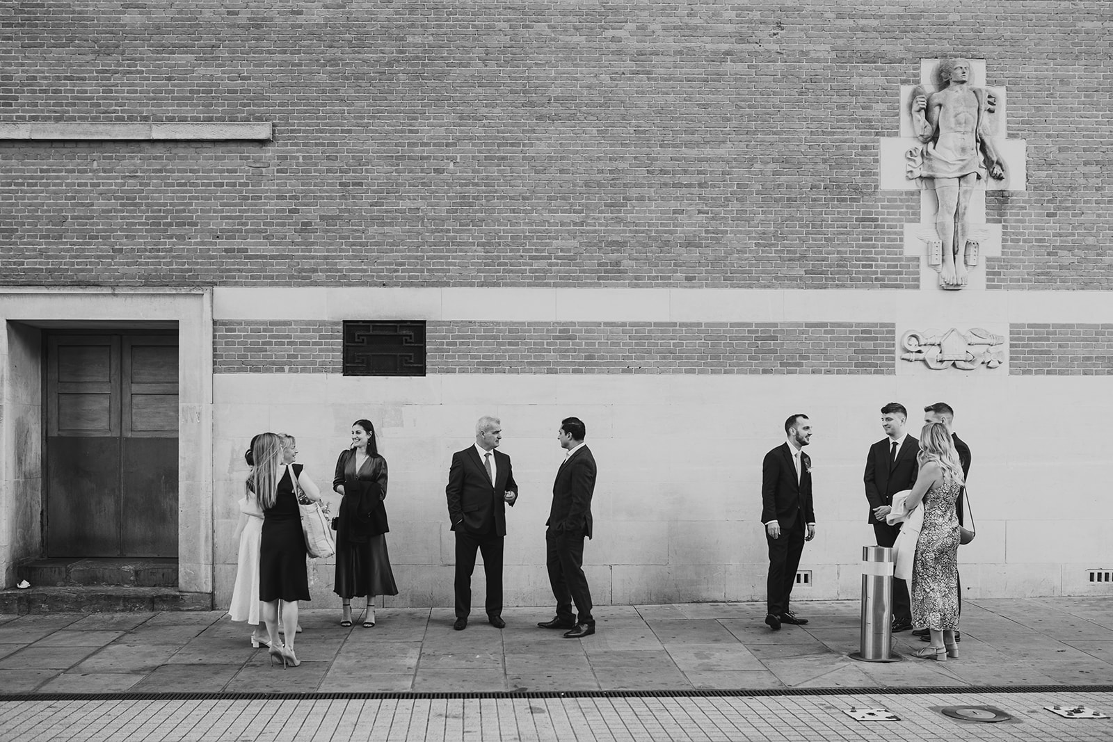 Newlyweds on the steps of Lambeth Town Hall, London