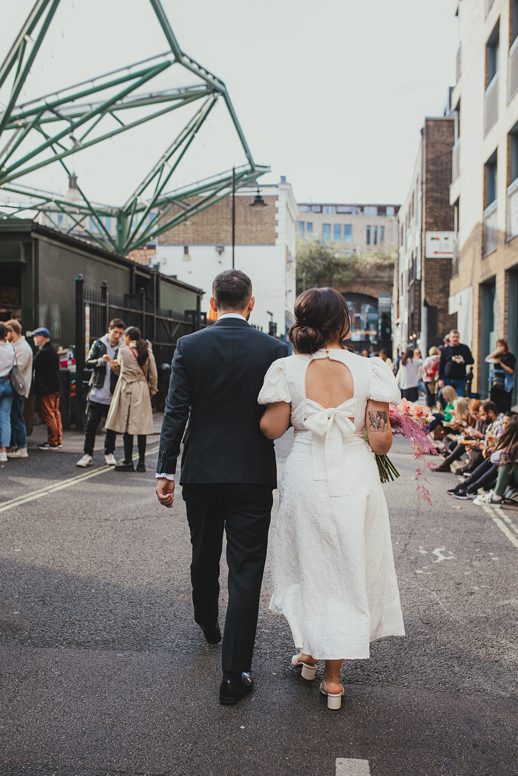 Couple at Hawksmoor Spitalfields for their East London wedding reception