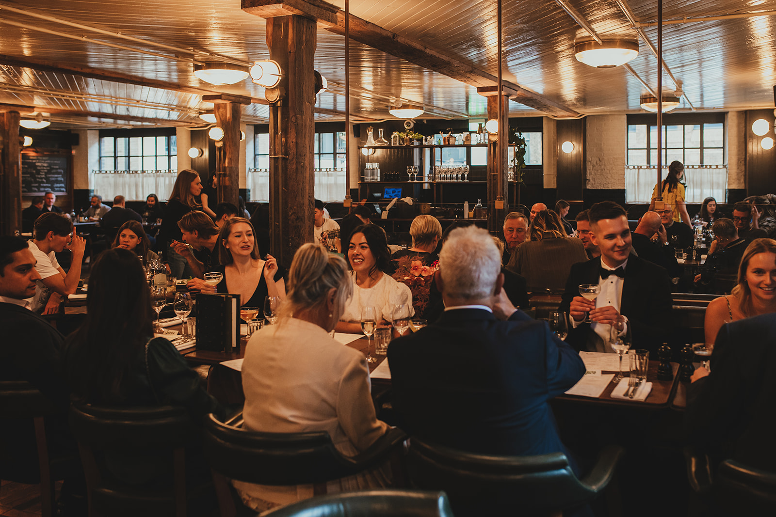Hawksmoor wedding reception, guests at dinner