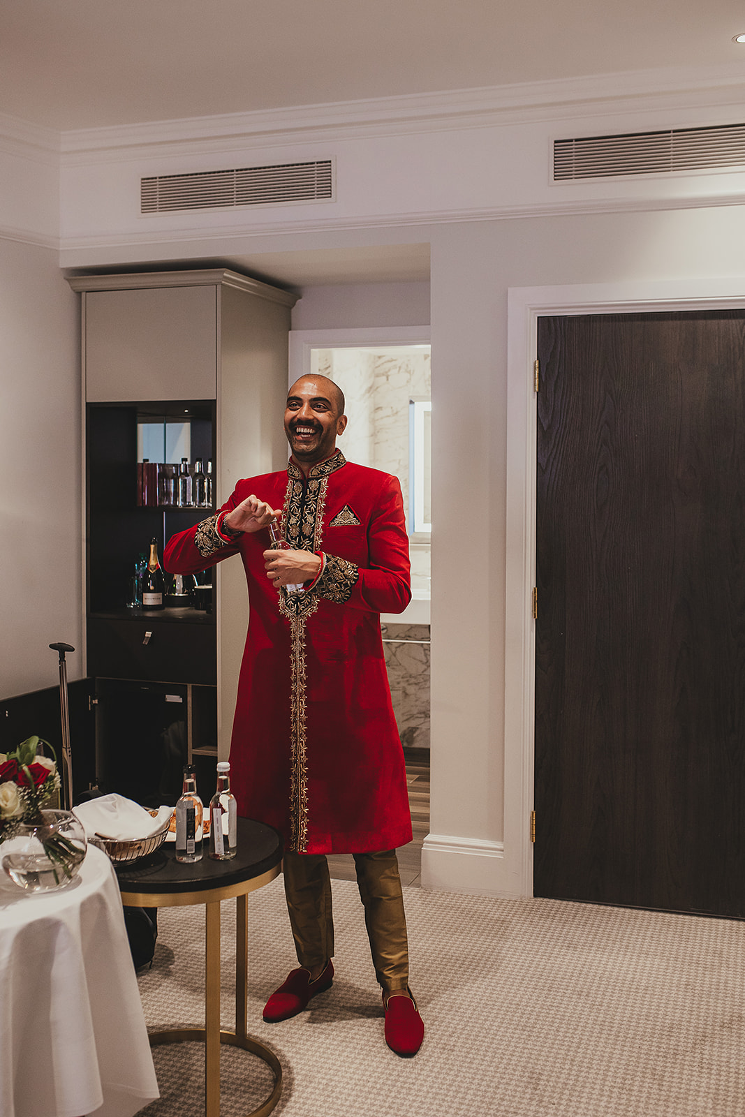 Groom getting ready at the Taj before the ceremony in London