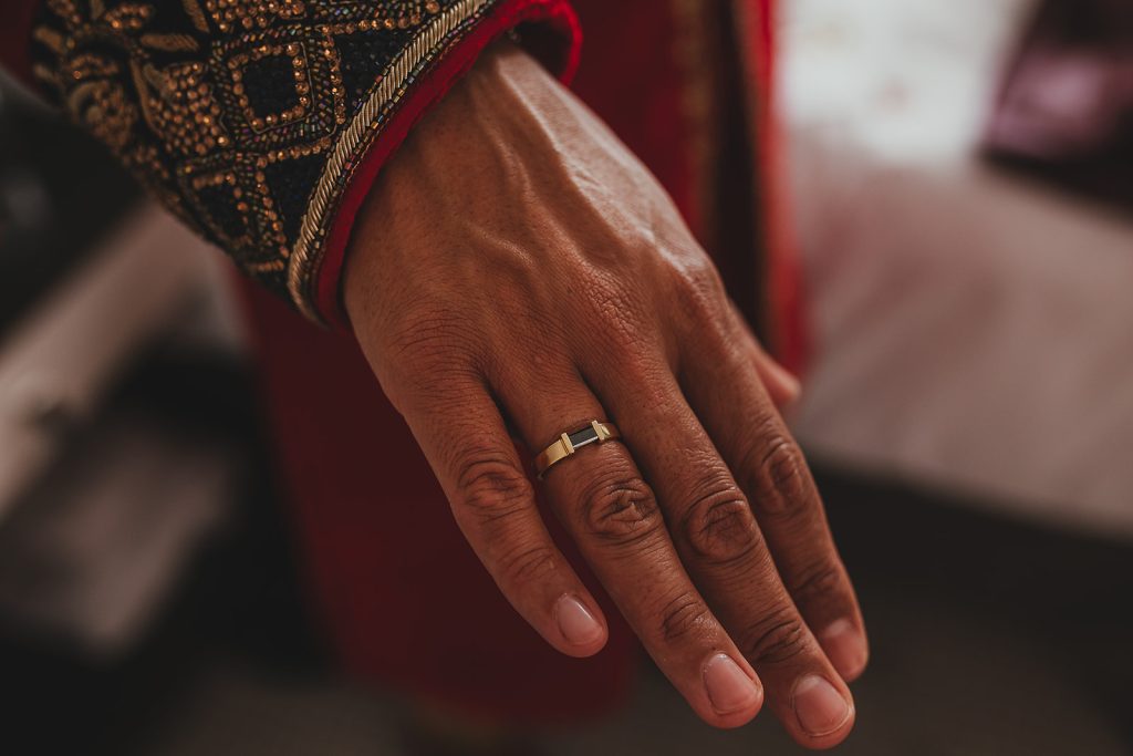 Detail photo of the groom's ring whilst getting ready at the Taj, London