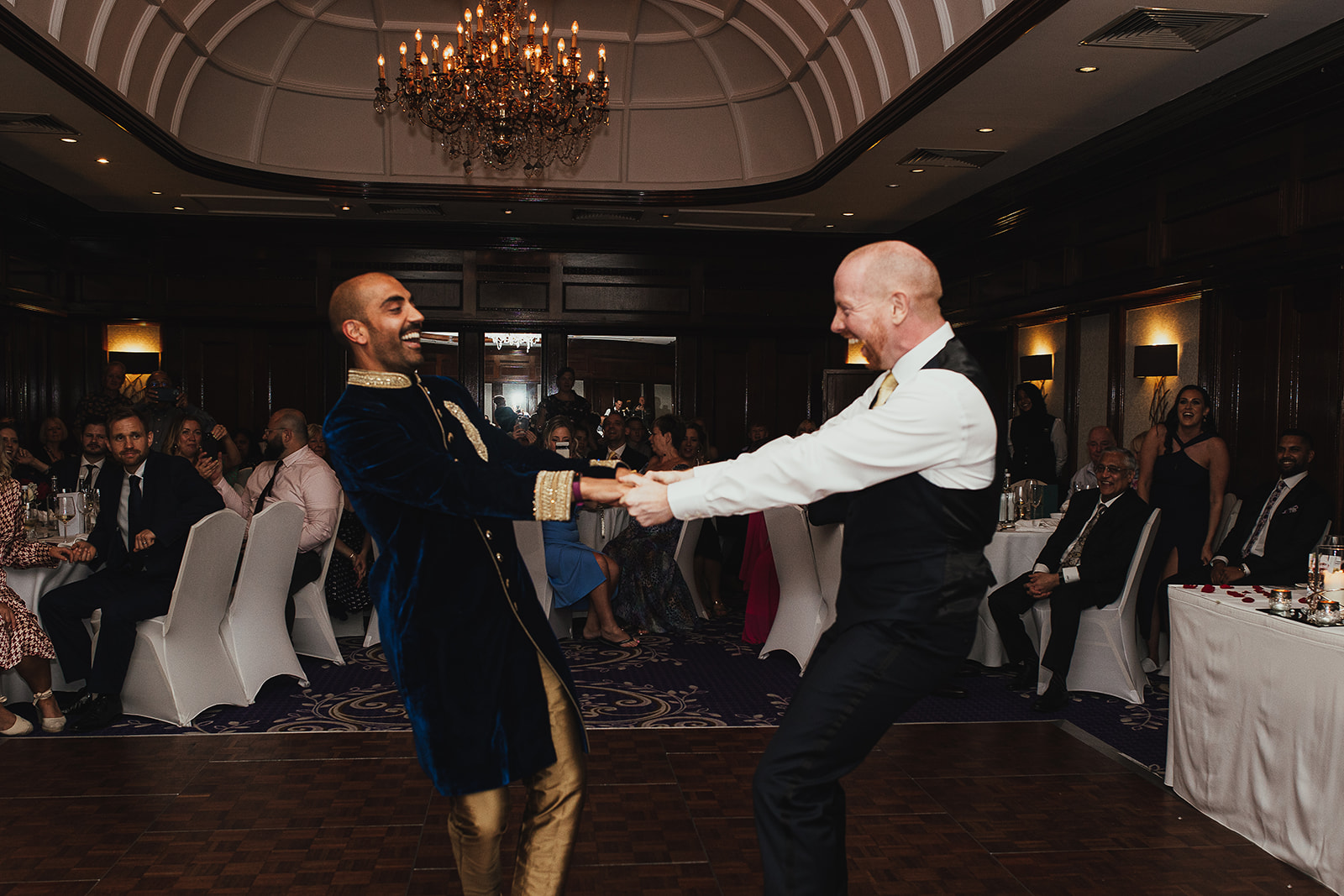 Groom and groom first dance at wedding reception at the Taj, London