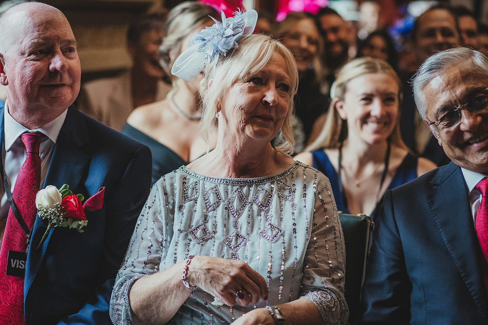 Guests supporting grooms at their wedding ceremony in the Palace of Westminster