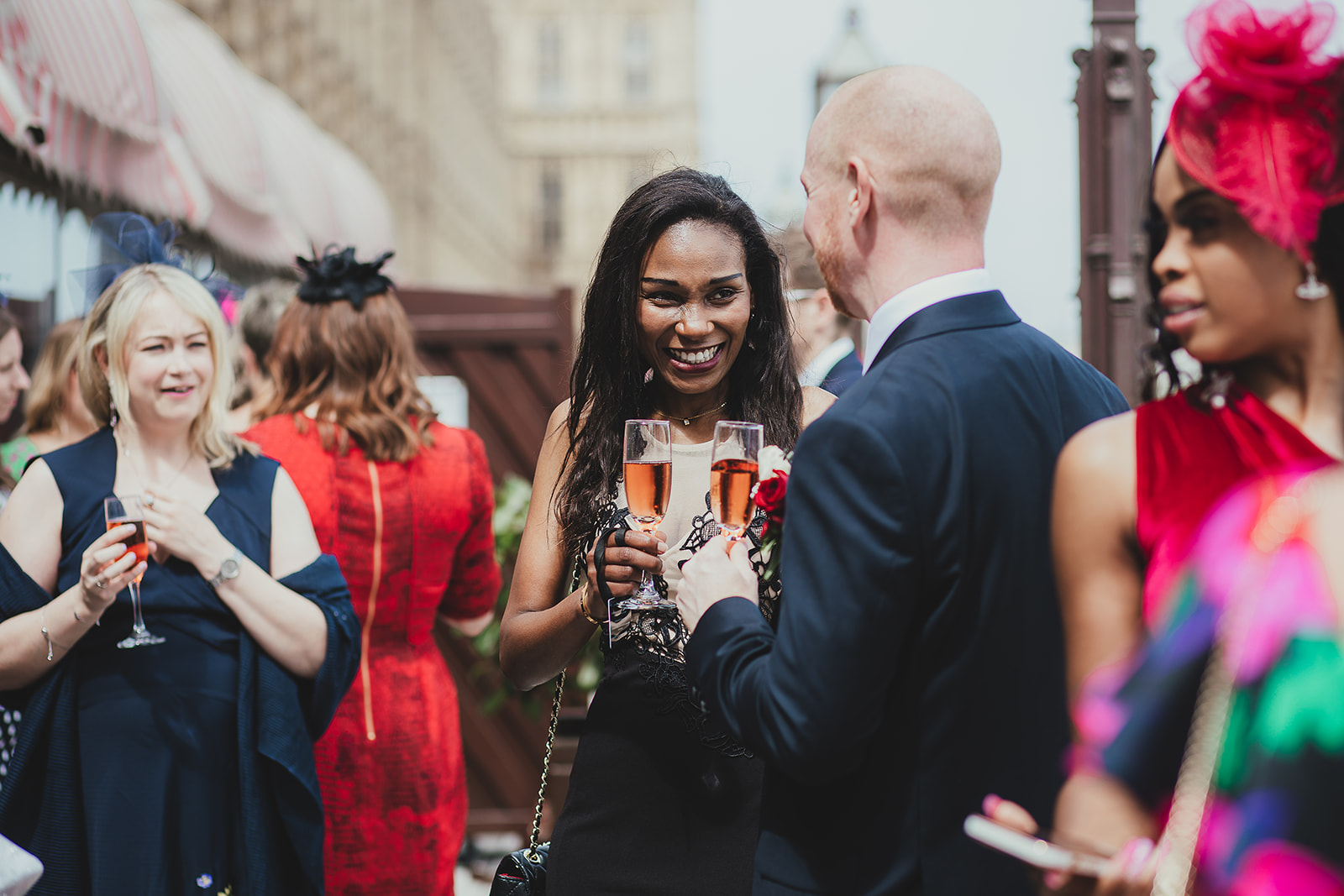 Guests at drinks reception on balcony of Palace of Westminster