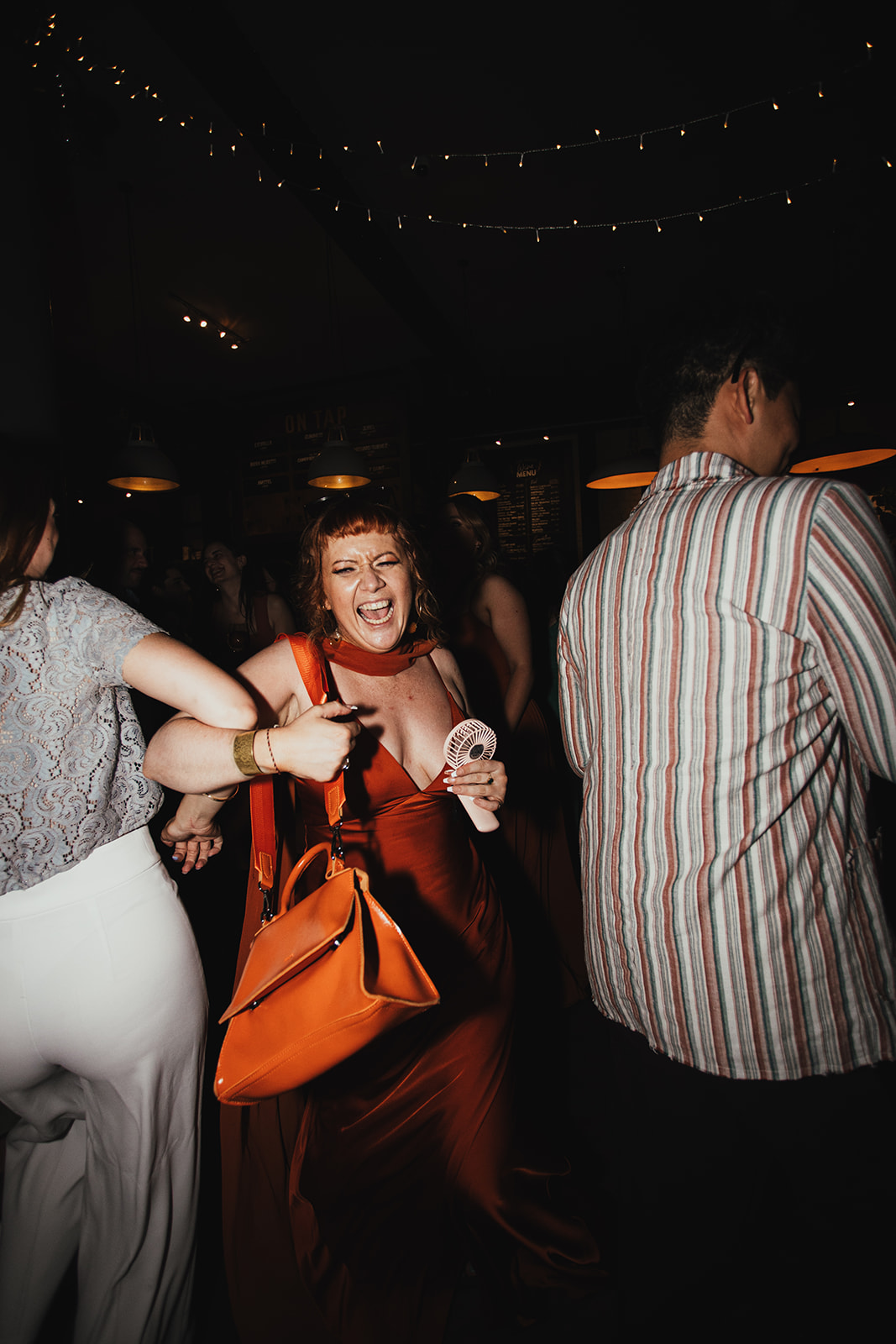 Guests dancing at The Depot N7 wedding reception, London wedding