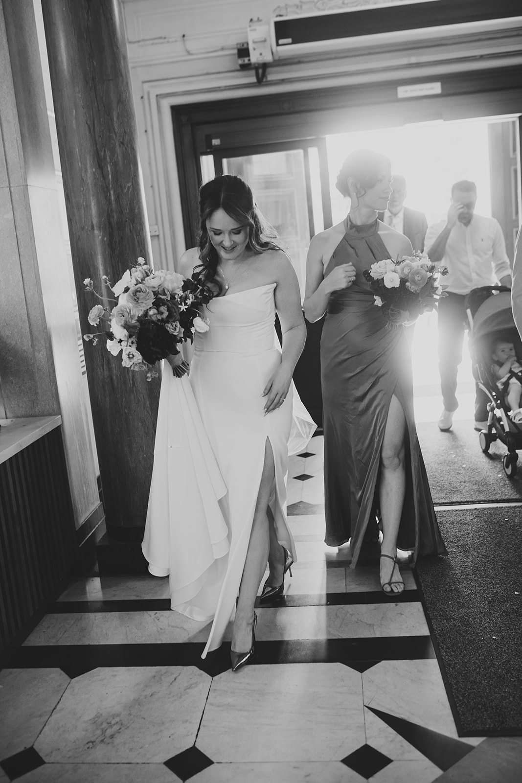 Bride and bridal party arriving at Islington Town Hall, London wedding