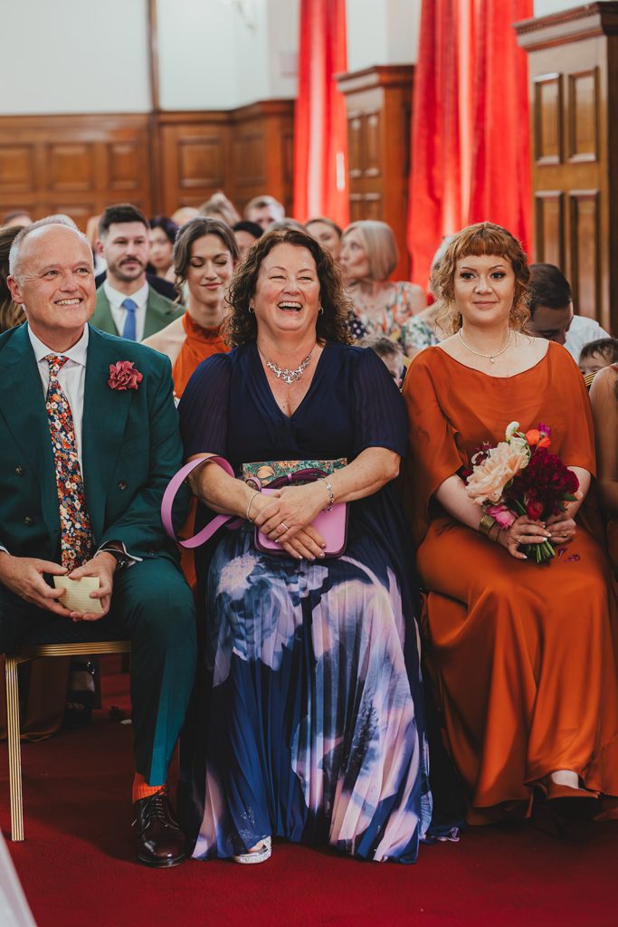Guests as they watch couple marry at their Islington Town Hall wedding