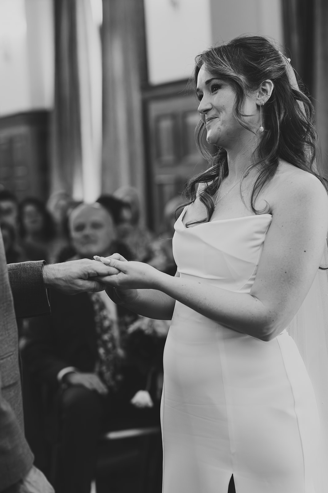 Bride exchanging rings at Islington Town Hall ceremony, London wedding