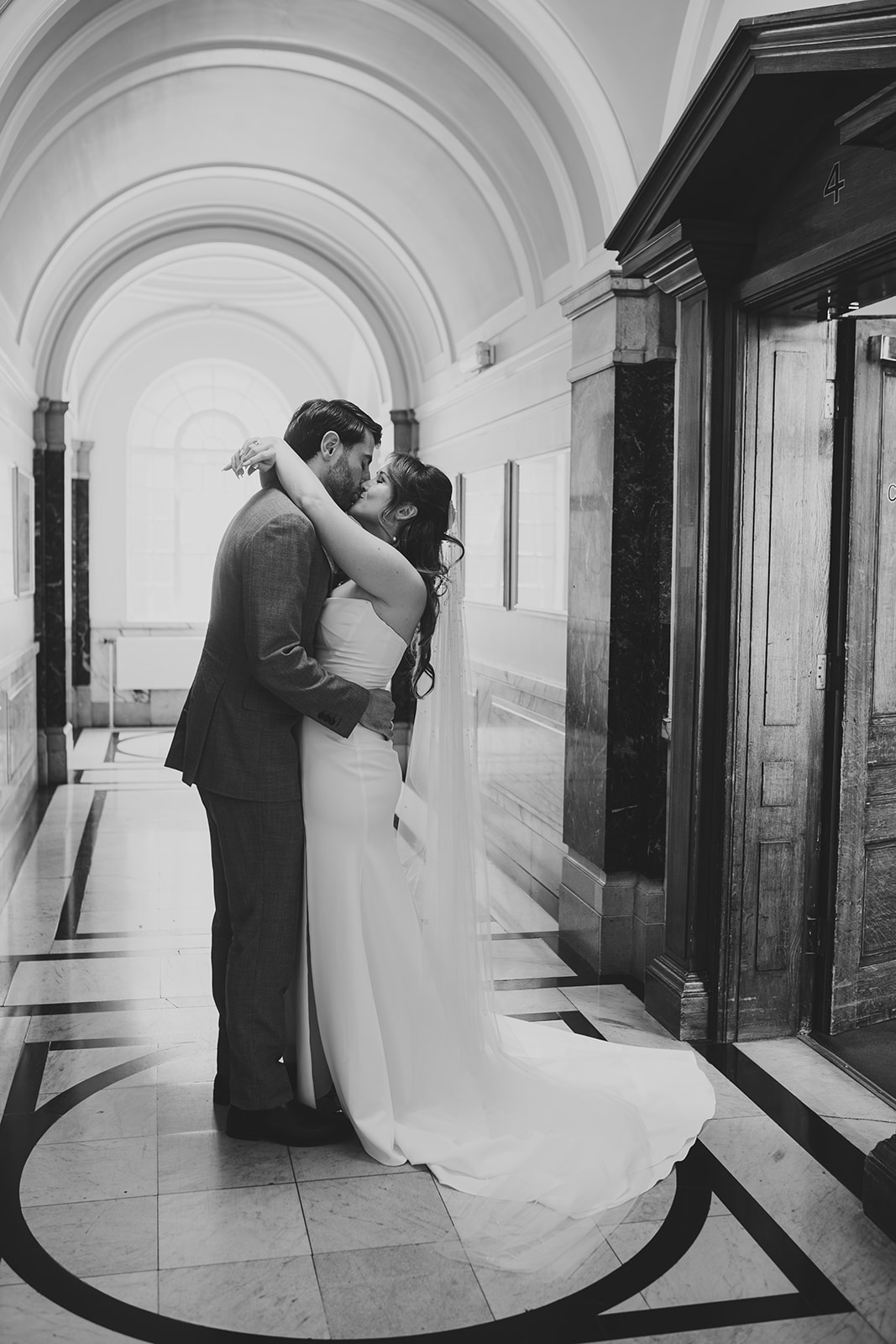 Couple portraits inside Islington Town Hall, London wedding