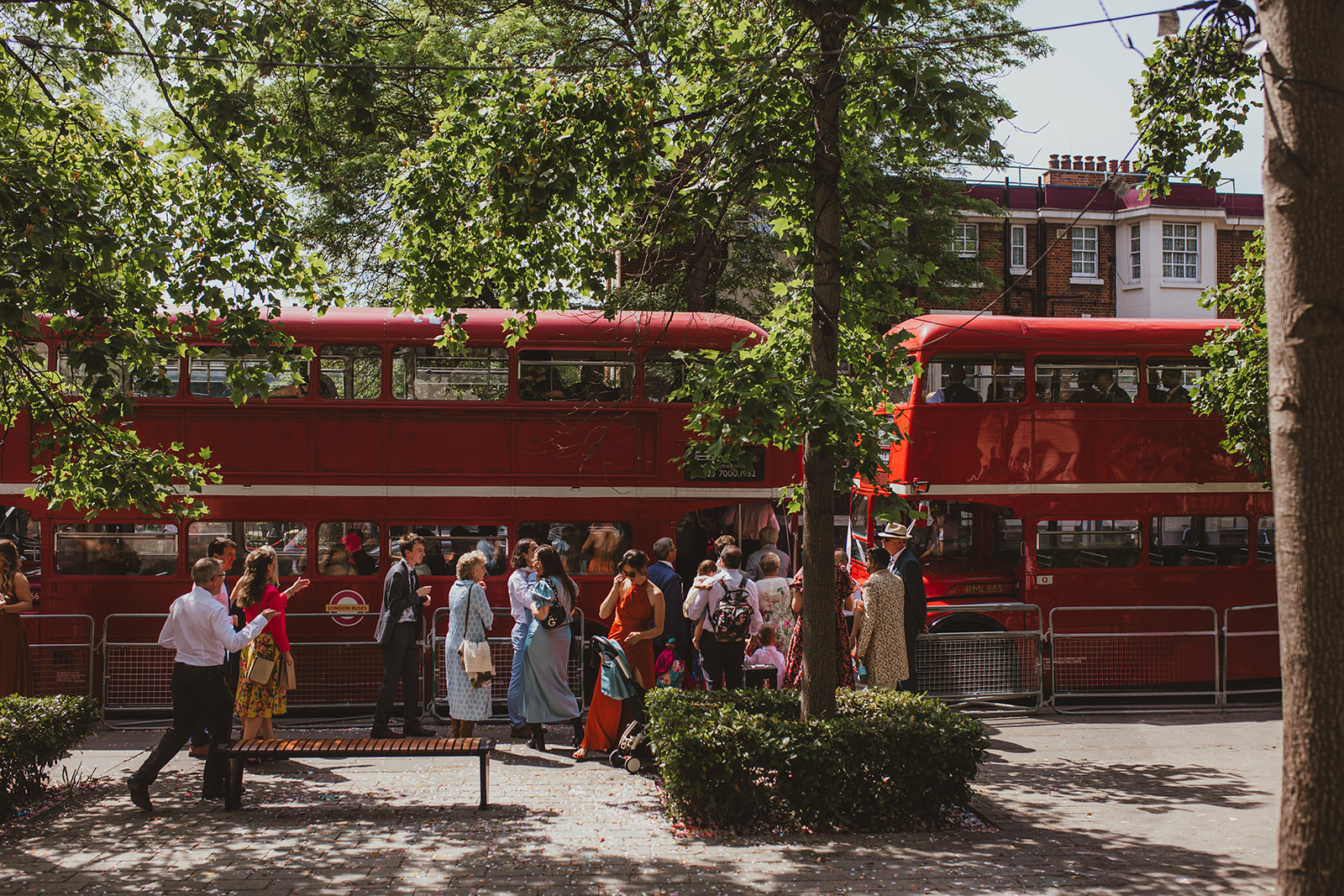 Route master buses outside Islington Town Hall to take wedding party to The Depot N7