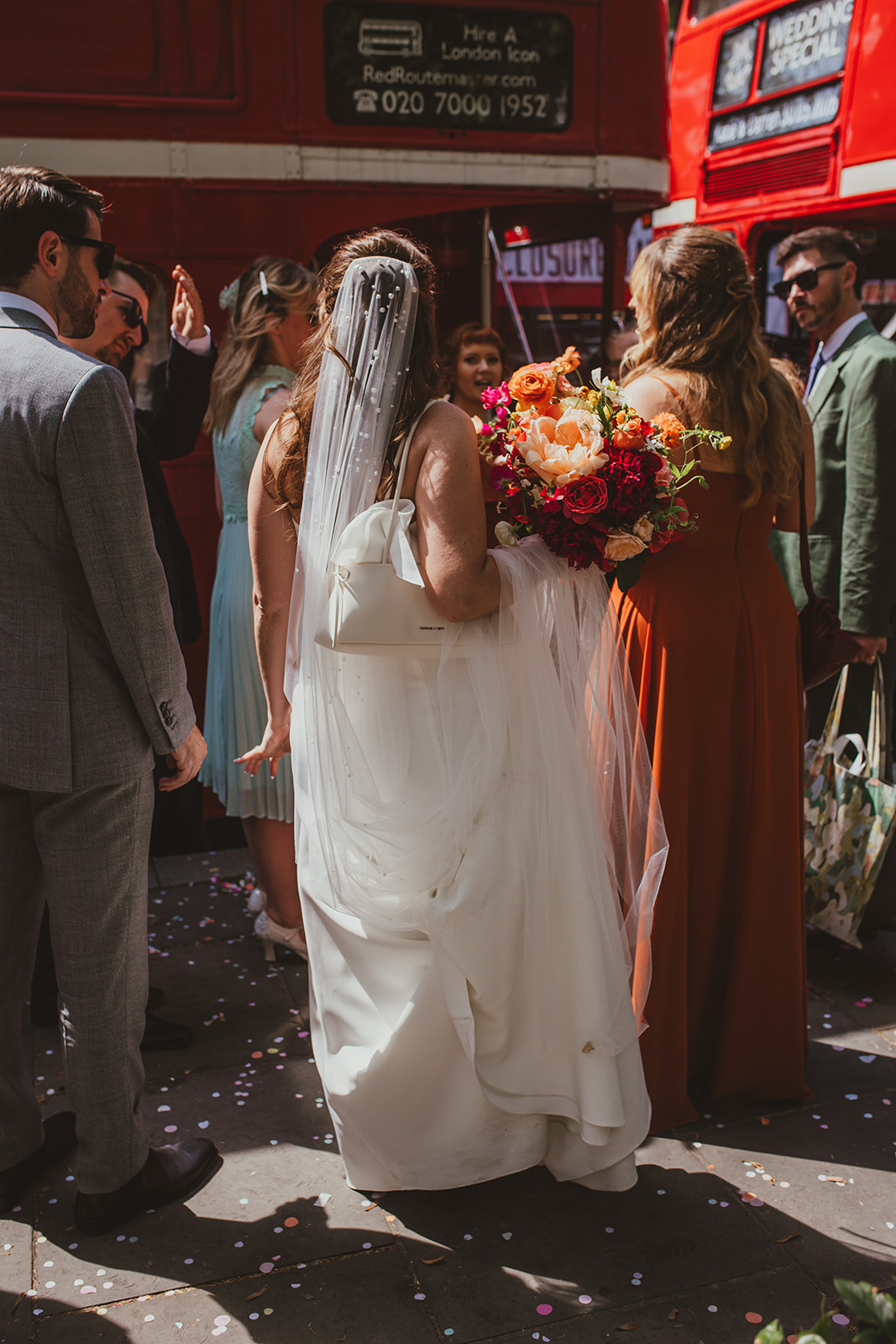 London wedding, Islington Town Hall, Bride and guests getting on route master bus