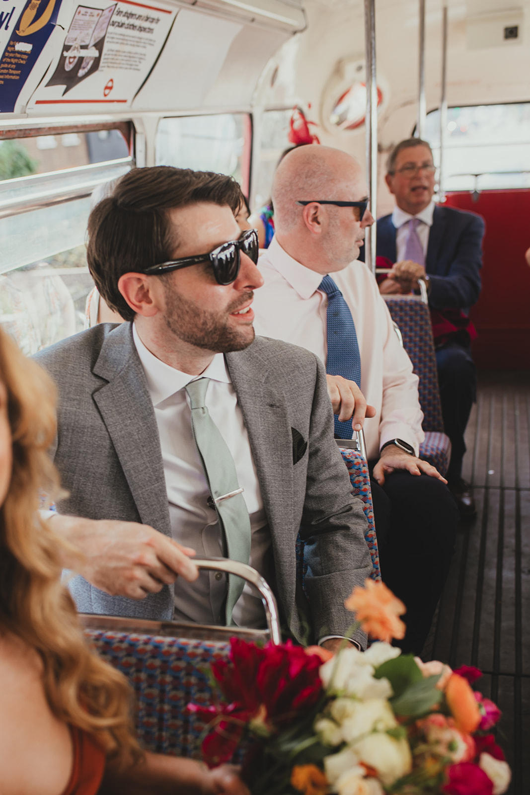 Groom on route master bus outside Islington Town Hall, Wedding reception at The Depot N7, London wedding