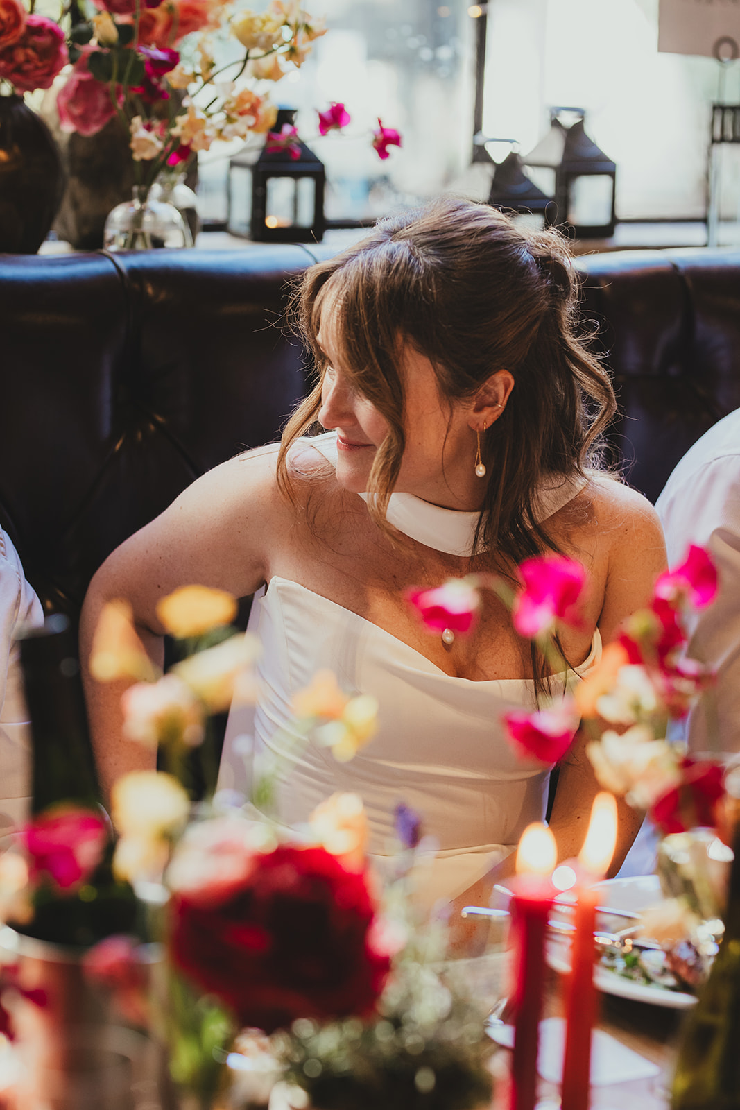Bride's reactions during wedding speeches at The Depot N7 wedding reception, London wedding