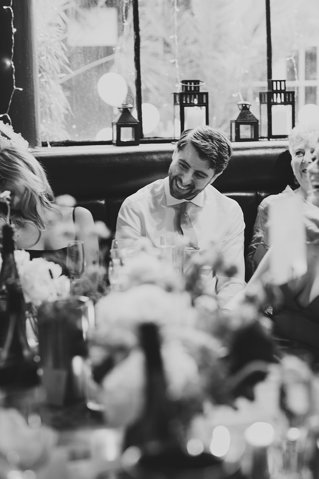Groom's reaction during wedding speeches at The Depot N7 wedding reception, London wedding
