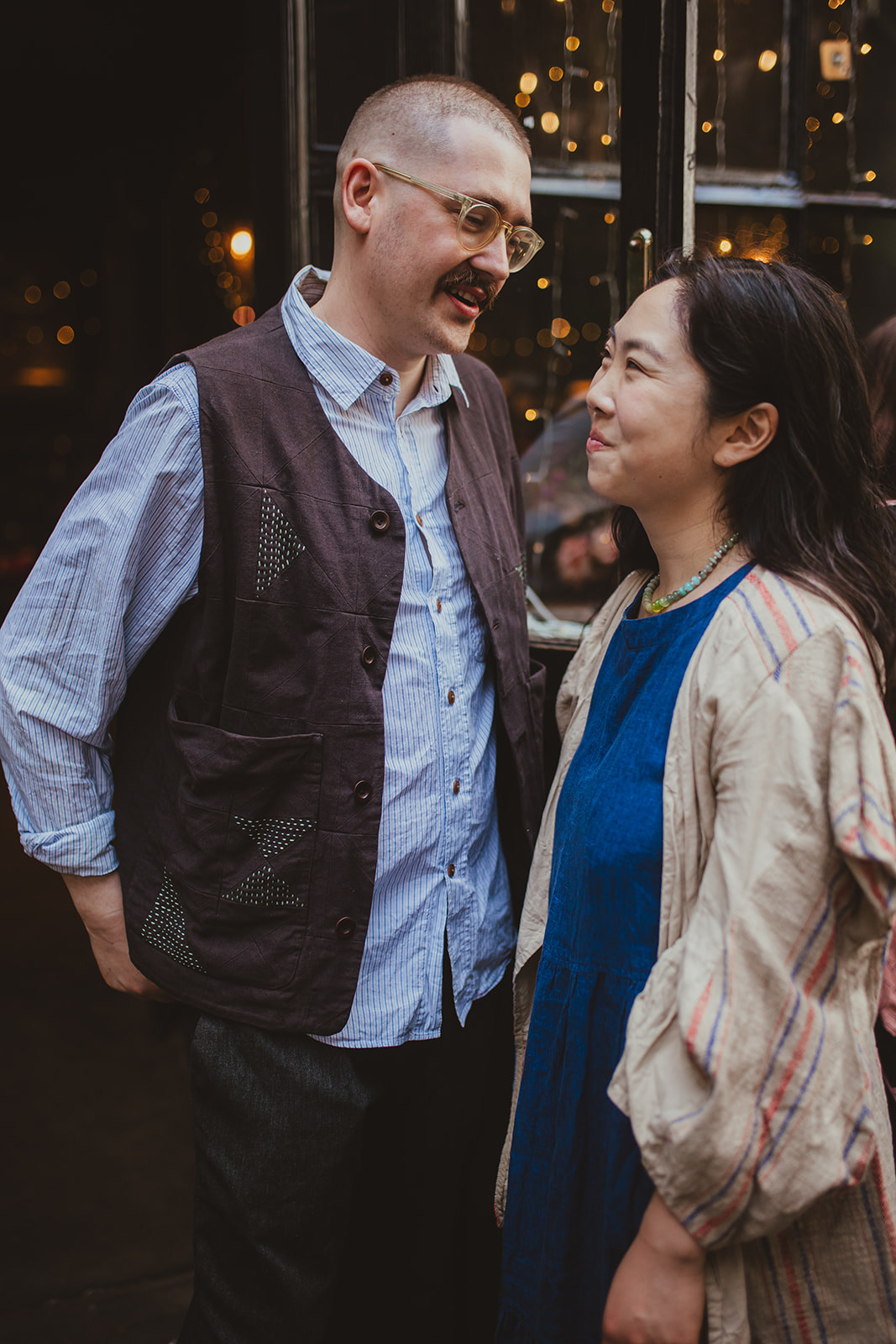 Guests laughing at The Depot N7 wedding reception, London wedding