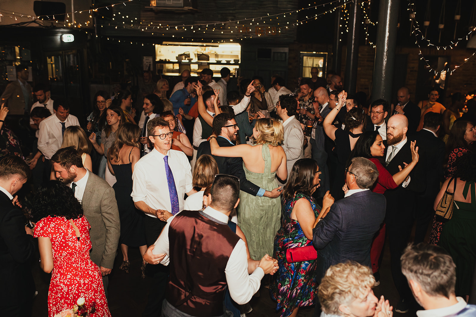 Guests dancing at The Depot N7 wedding reception, London wedding