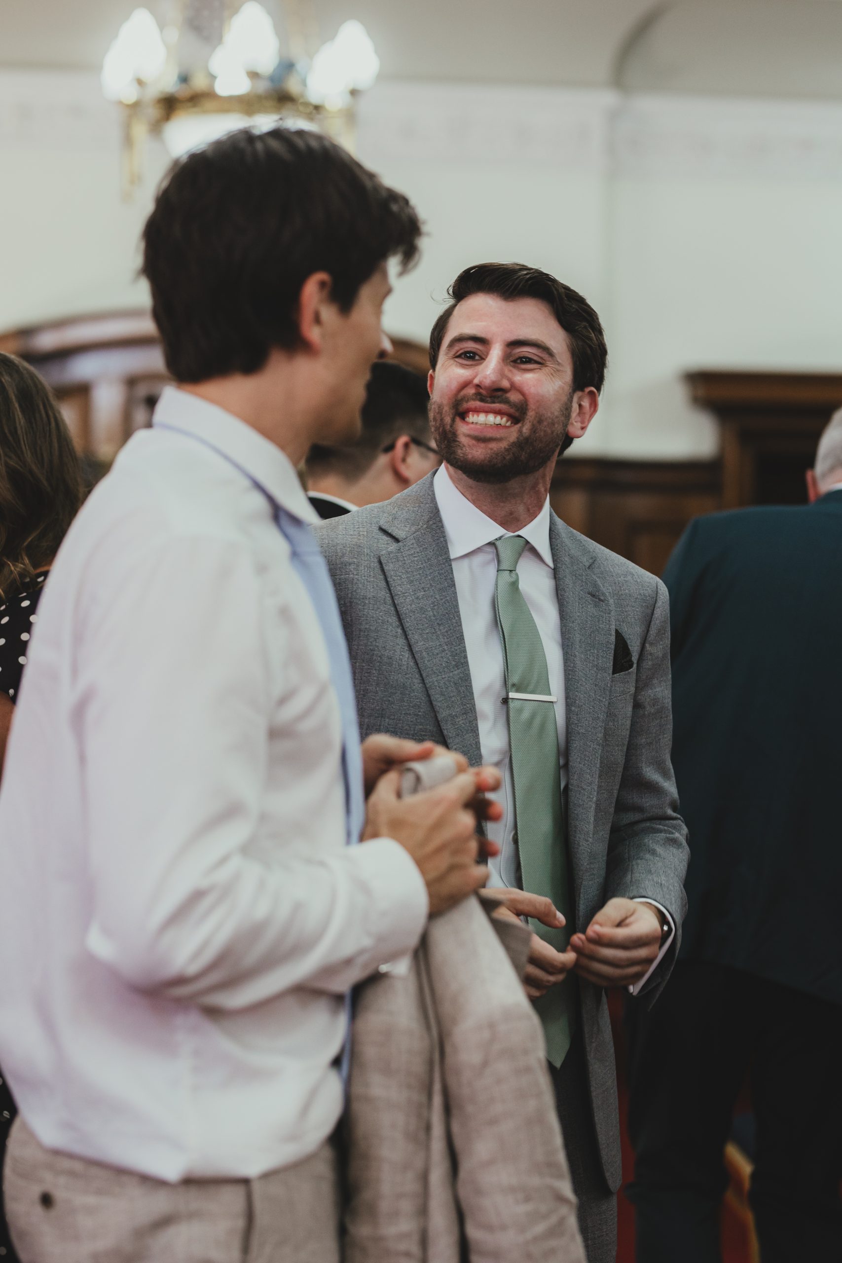 Groom waiting for bride at Islington Town Hall, London wedding