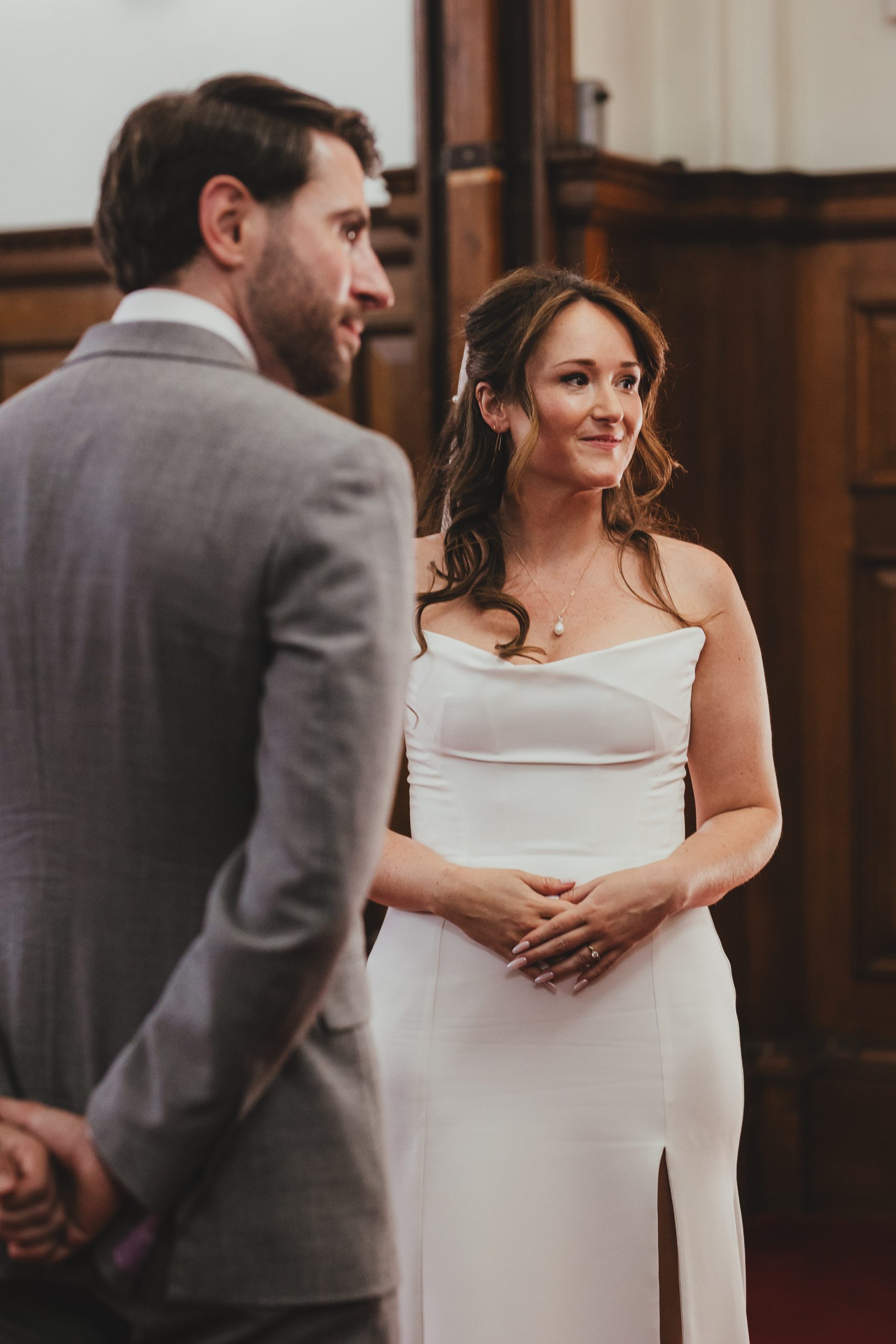 Bride and groom during wedding ceremony at Islington Town Hall, London wedding