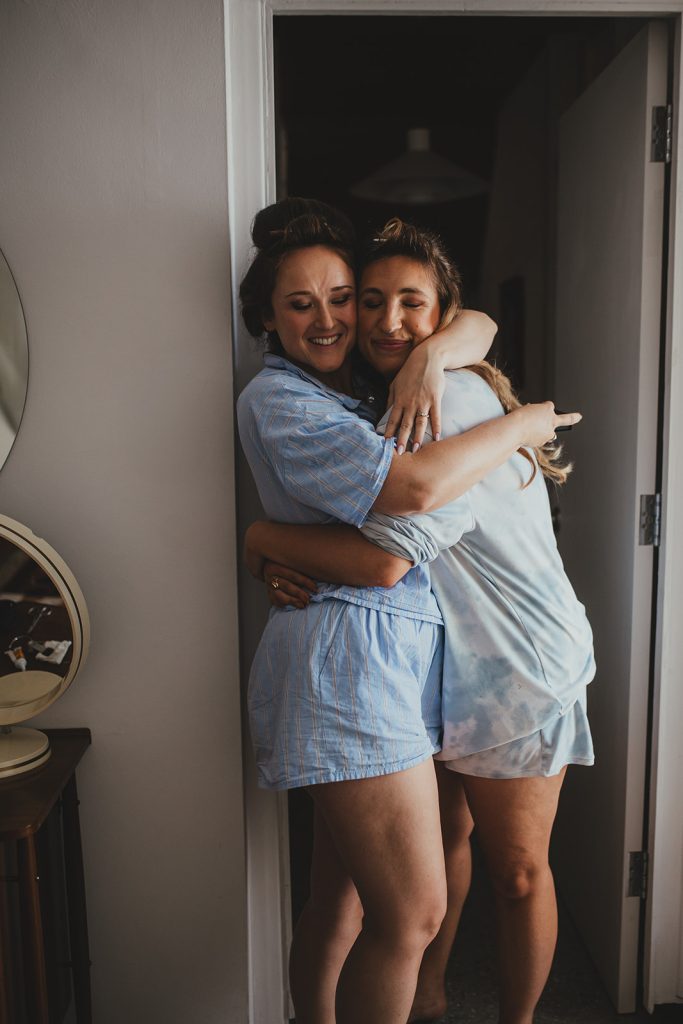 Bride and bridesmaid getting ready, London wedding