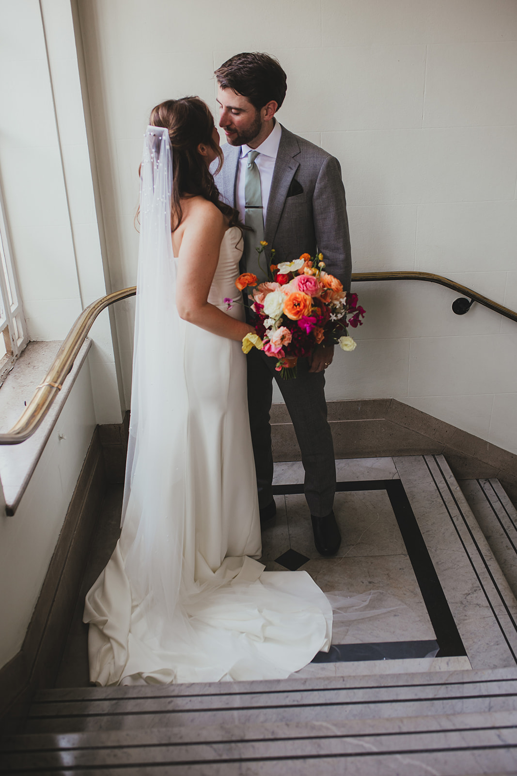 Couple portraits inside Islington Town Hall, London wedding
