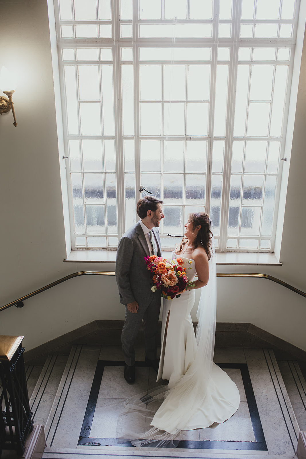 Couple portraits inside Islington Town Hall, London wedding