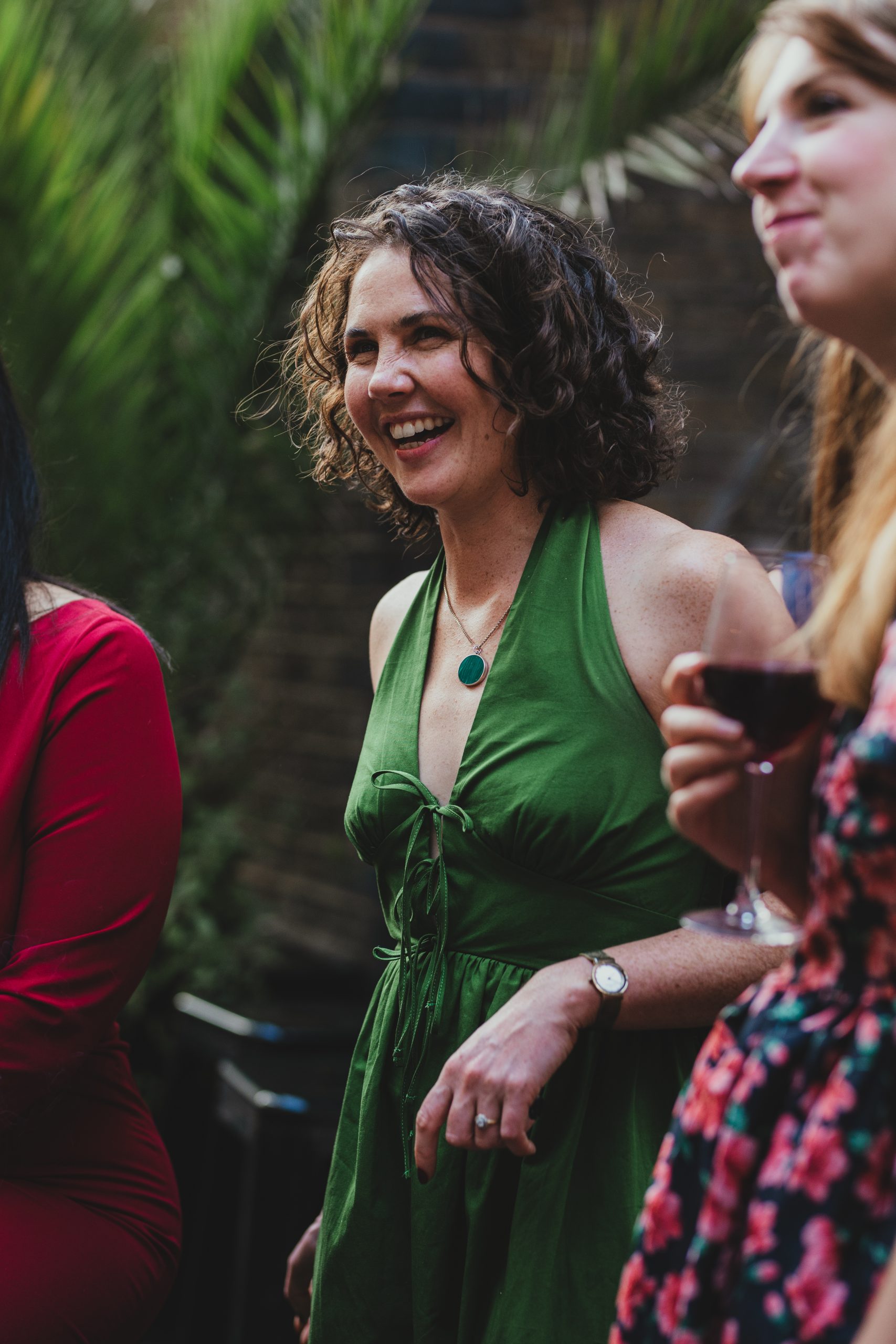Guests laughing at the Depot N7 wedding reception, London wedding