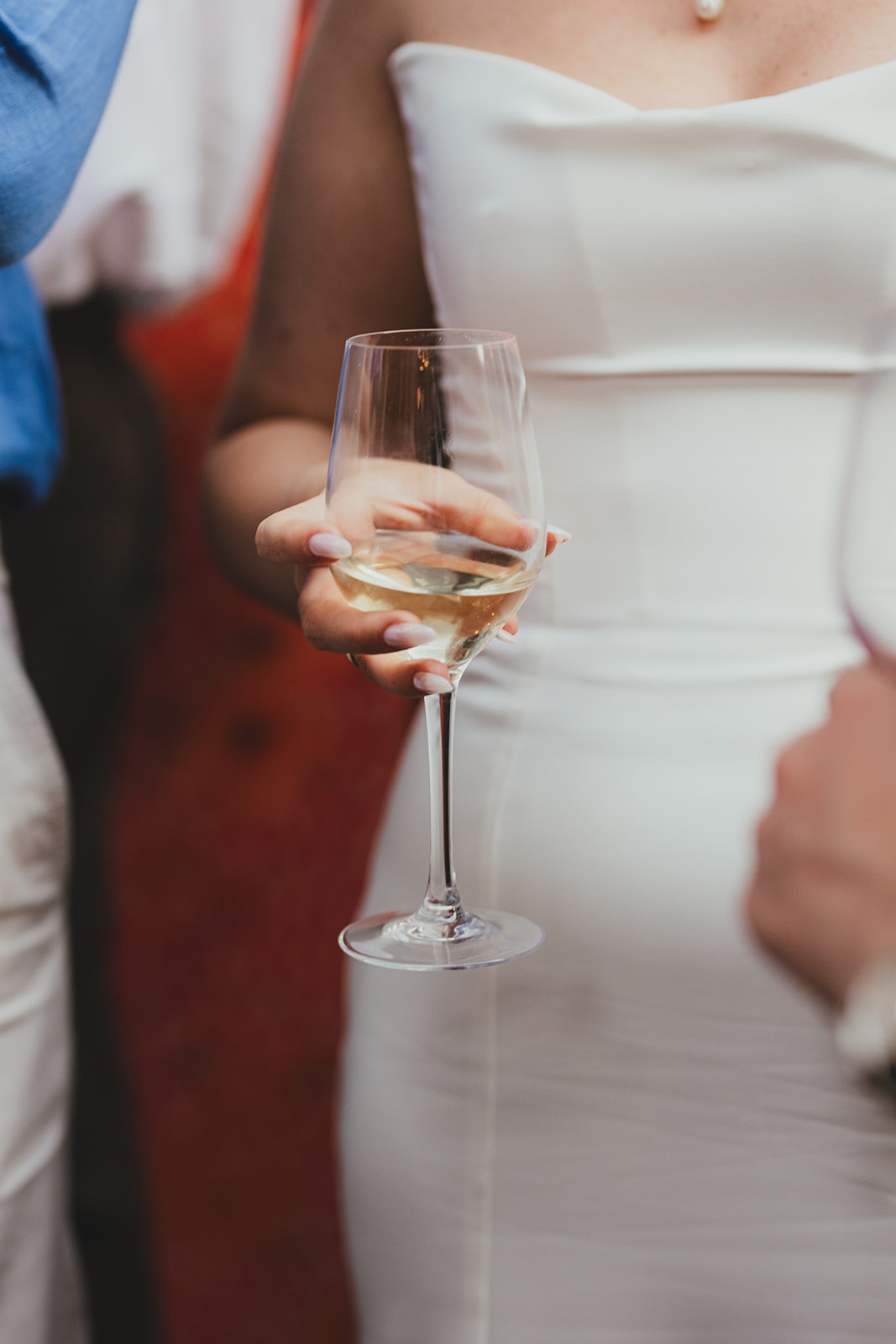 Bride holding wine at wedding reception at The Depot N7, London wedding