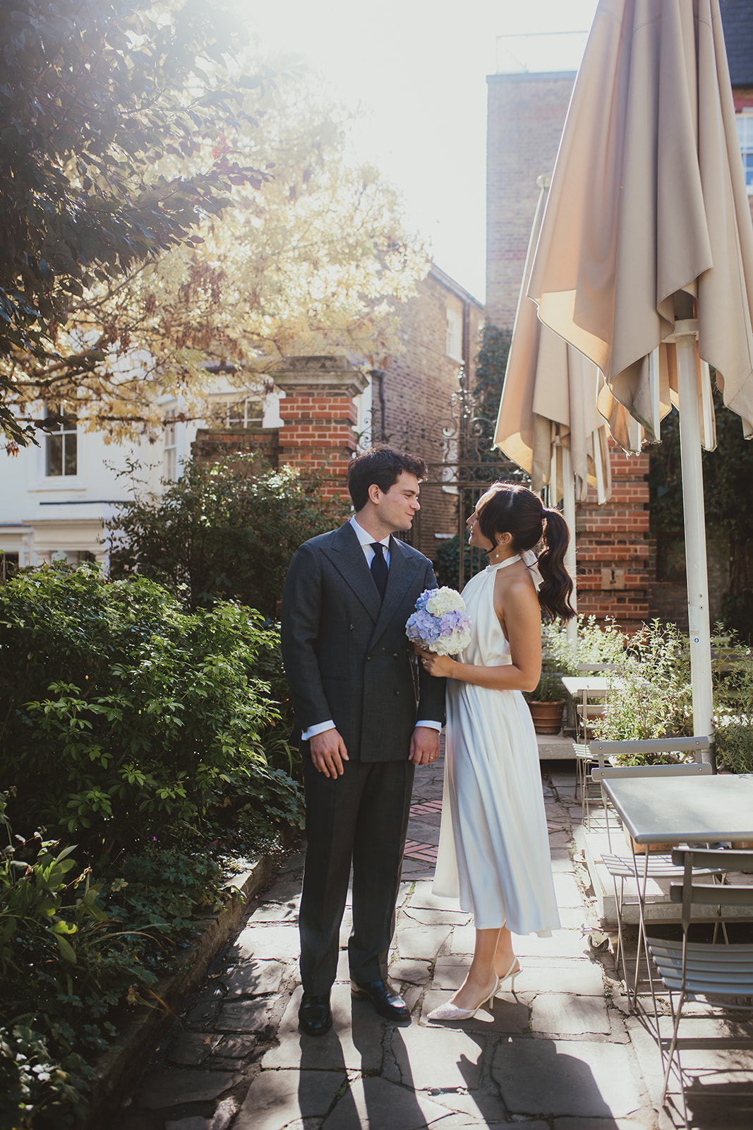 Bride and Groom outside Burgh House with soft sunlight 